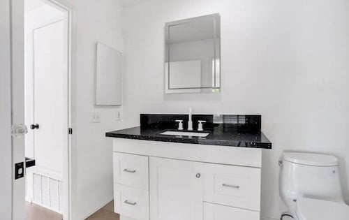 New bathroom with modern fixtures after renovation