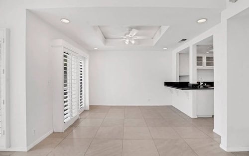 New beige tile flooring in restored house